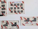 several pieces of paper with a drawing of a train on them