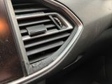 a air vent in the center of a car