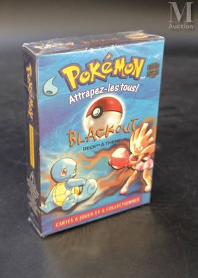 a box of pokemon cards sitting on a table