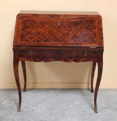 a small wooden desk with a drawer on top of it