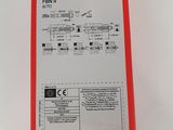 the back of a red box with a white label on it