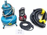 two vacuums, a hose, and a pump on a white surface