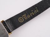 an image of a wrist watch with a black strap and a gold watch face
