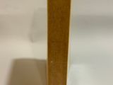 a small wooden block that is sitting on a table