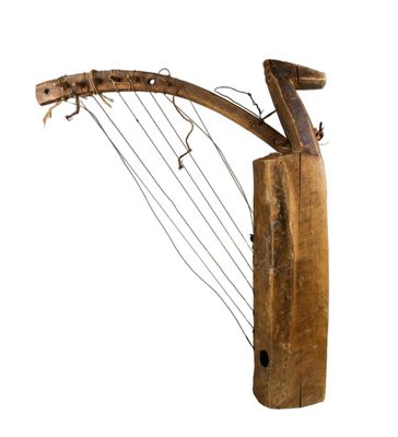 un vieil instrument de musique en bois, doté d'un long manche et de cordes
