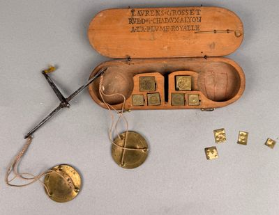 a wooden box that has some type of stamps in it