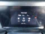 a digital display in the center of a car