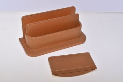 Nécessaire de bureau gainé de cuir piqué ( porte courrier et…