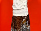 an image of a dress on a mannequin stand