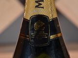 a bottle of champagne that is sitting on a table
