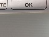 a close up of a sign on the side of a refrigerator