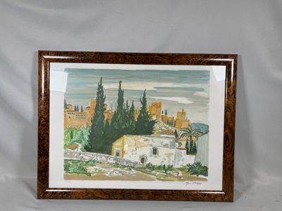 tableau encadré représentant un paysage avec un château en arrière-plan