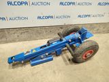 a close up of a blue hand truck with a large tire
