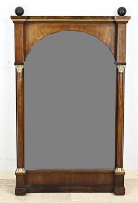 an image of a large mirror sitting on top of a wooden floor