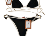 a black and white bikini set with a tag on it