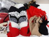 a lot of lingerie items on a white table