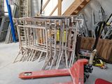 a large pile of tools sitting in a garage