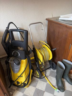 a yellow and black vacuum and a black and white checkered floor