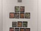 an image of a picture of a bunch of stamps on a table