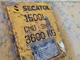 a yellow sign on the side of a yellow tank