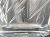 a close up of a glass on a table