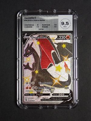 a close up of a pokemon card with a dragon on it