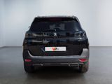 a picture of the back end of a black suv