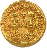 une pièce d'or sur laquelle figurent un homme et une femme