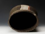 a close up of a pipe on a white surface