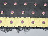 a close up of a piece of fabric with flowers on it