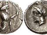 a silver coin with an image of a man on it