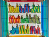 a multicolored scarf with a picture of a train on it