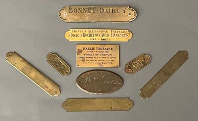 a lot of brass items that are on a table