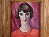painting of a woman in a red sweater in a gold frame