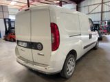 a picture of a white van parked in a garage