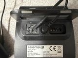 a small black device that is connected to a charger