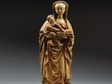 an image of a statue of a woman holding a child