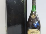 a bottle of champagne sitting next to a box