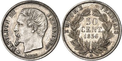 a silver coin with a portrait of a man on it