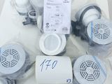 a lot of different types of air purifiers on the table
