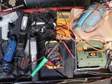 a box full of electrical equipment that is sitting on the floor