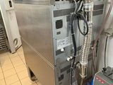 a machine that is sitting inside of a kitchen