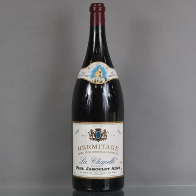 a bottle of wine that is sitting on a table