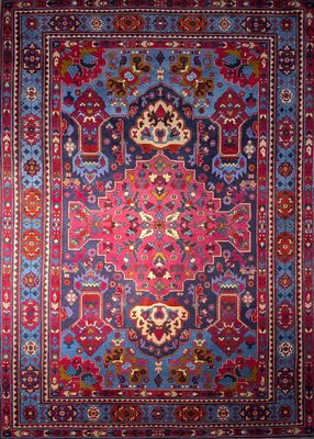 an oriental rug with a red and blue design
