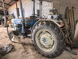 a tractor that is parked in a building