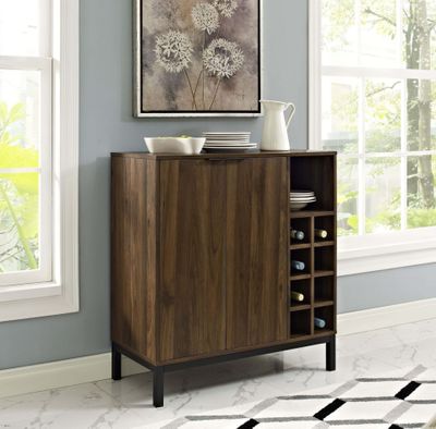 a wooden cabinet with a wine rack in front of a window