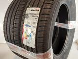 an image of a tire on display in a showroom