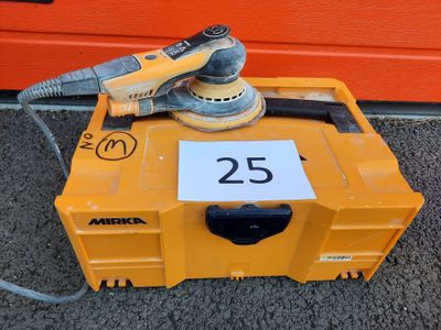 a yellow box with a sander on top of it