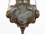 a hanging lamp with a crown on top of it