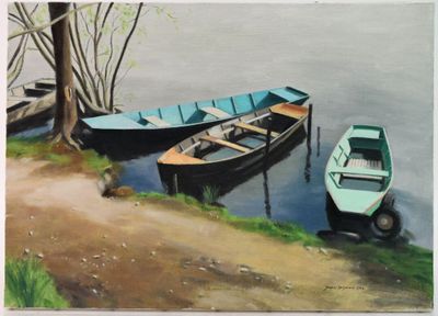 two boats that are sitting on the shore of the water
